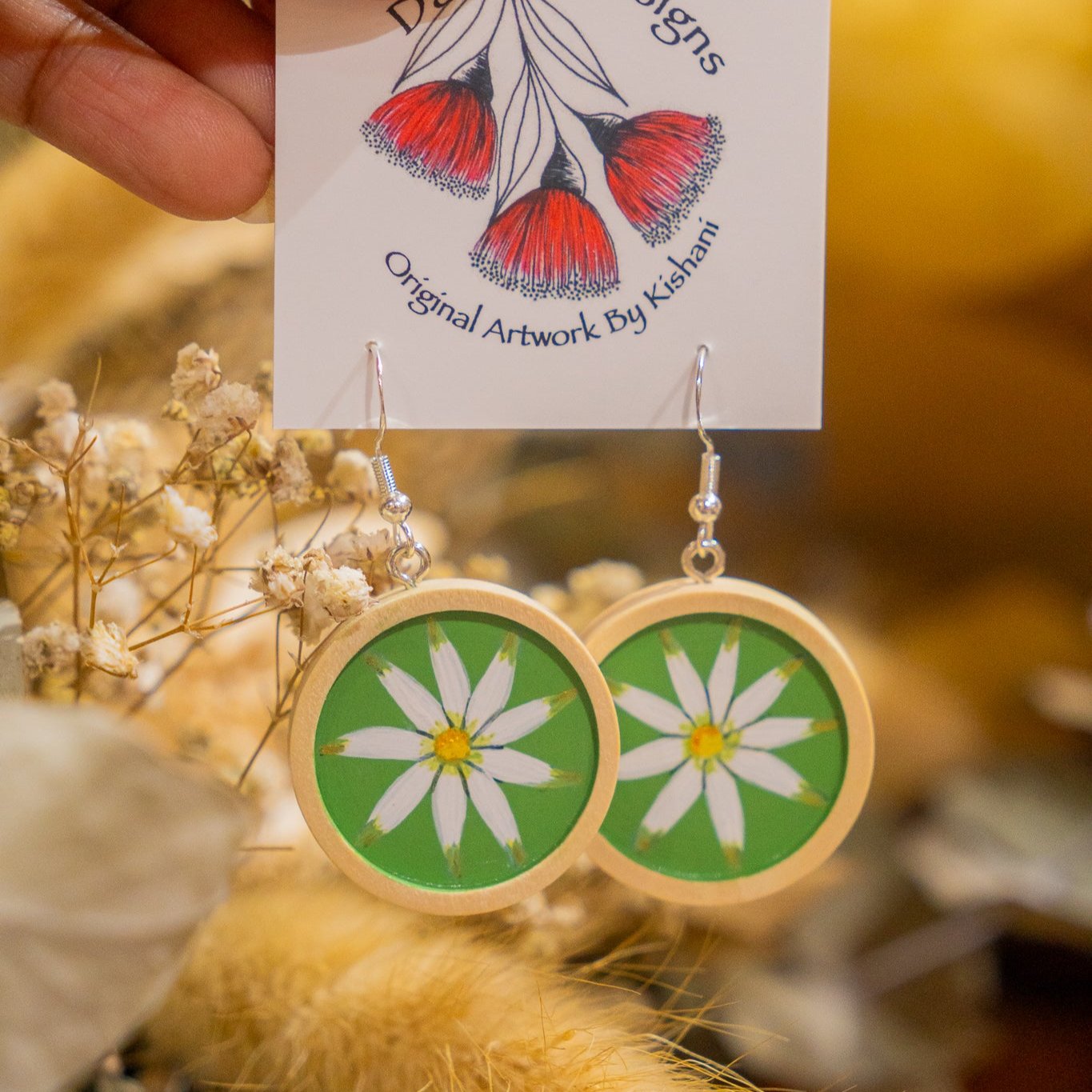 wooden cabachon dangle earrings pained with flannel flowers
