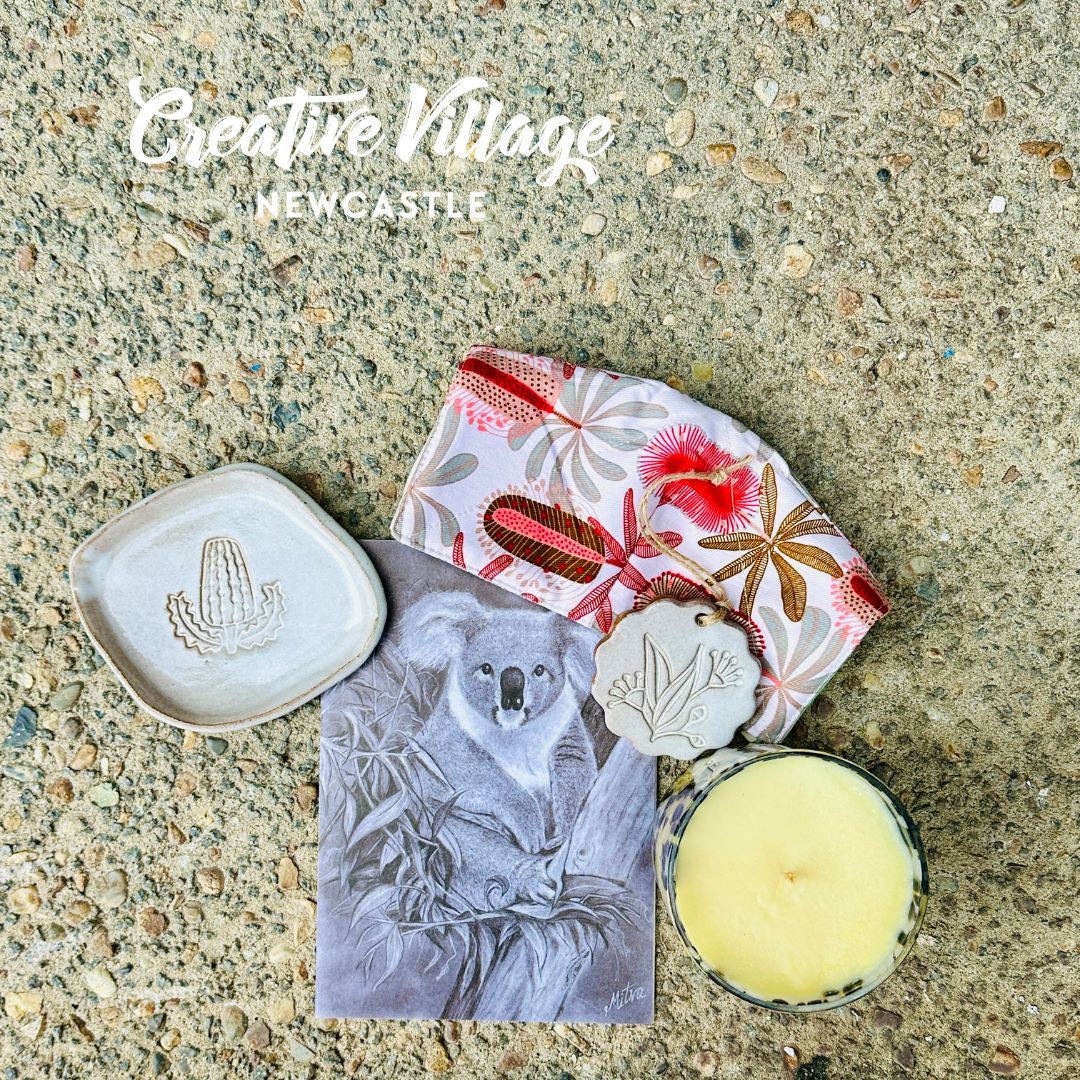 Australian handmade gift pack featuring koala pencil drawing art print, banksia ceramic dish, gum leaf ceramic ornament, lemon myrtle candle and banksia fabric bowl cosy