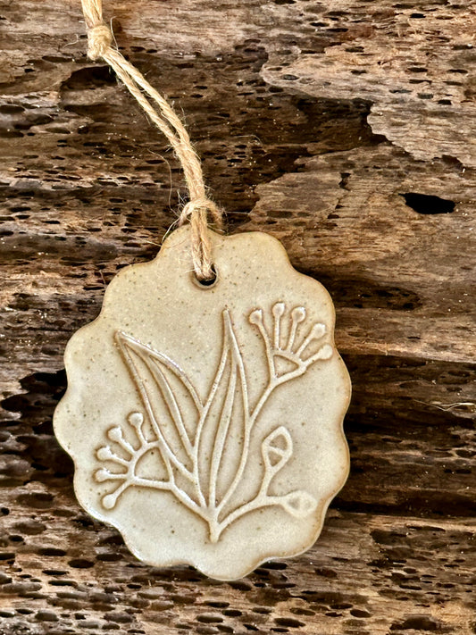 Handmade ceramic decorations with Australian flowers